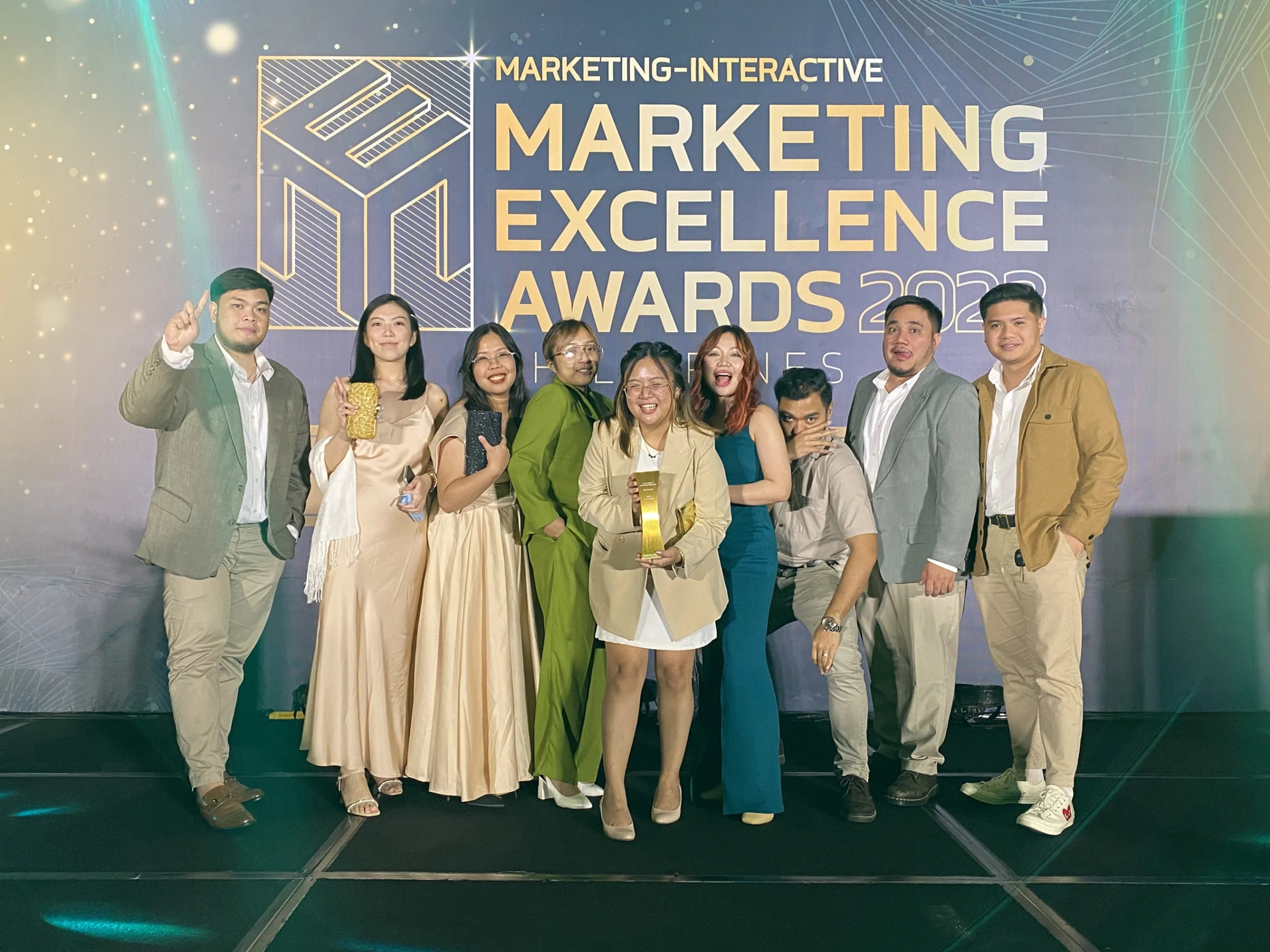 Propelrr team with their gold award for excellence in data driven marketing