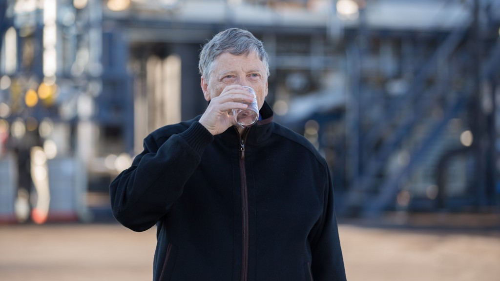 Bill Gates takes a sip of water